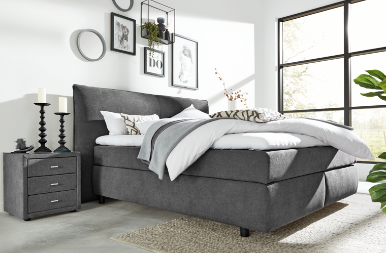 Modernes Polsterbett „IL 1414“ in Grau mit gepolstertem Kopfteil.